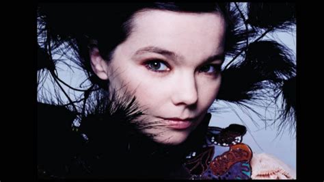 bjork attired in black feathers